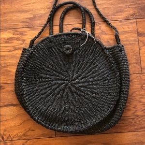 Hand woven circle bag by albaca